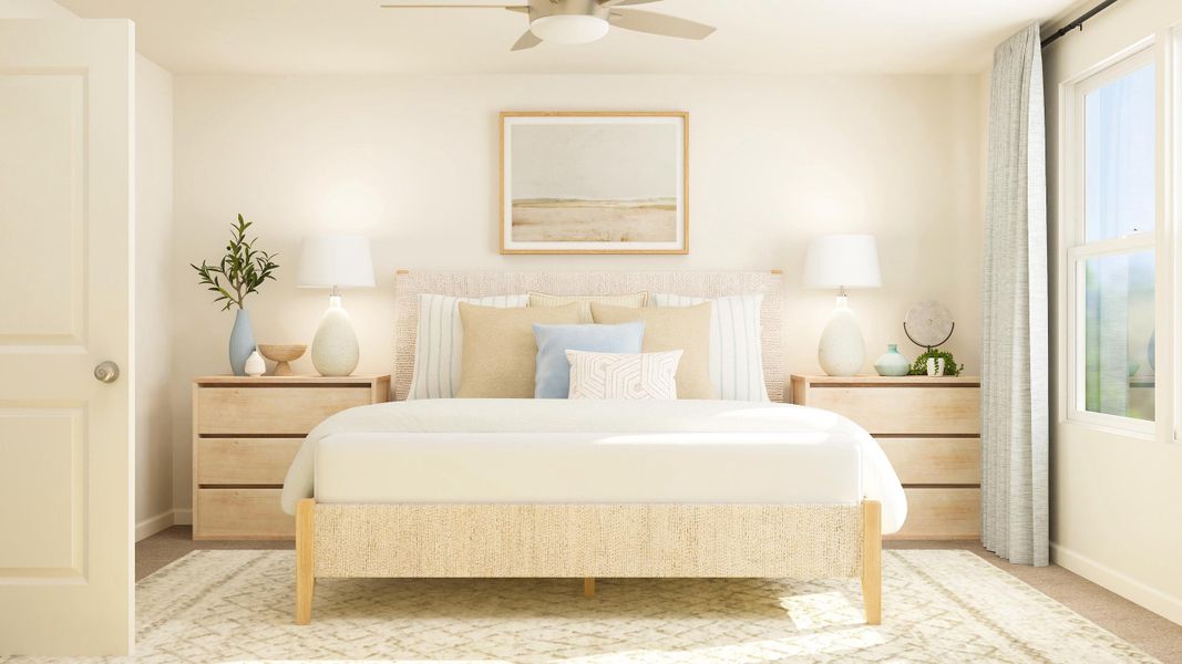 A bed with a white bed spread.