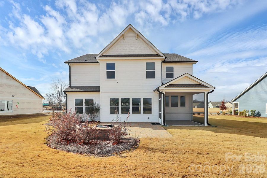 Exterior details and patio area of a home in Stonebridge Fairways, Monroe (Image 24).