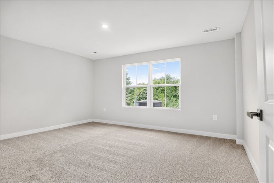 Spacious, unfurnished interior of a new home in Arden Woods, Greenville (Image 13).