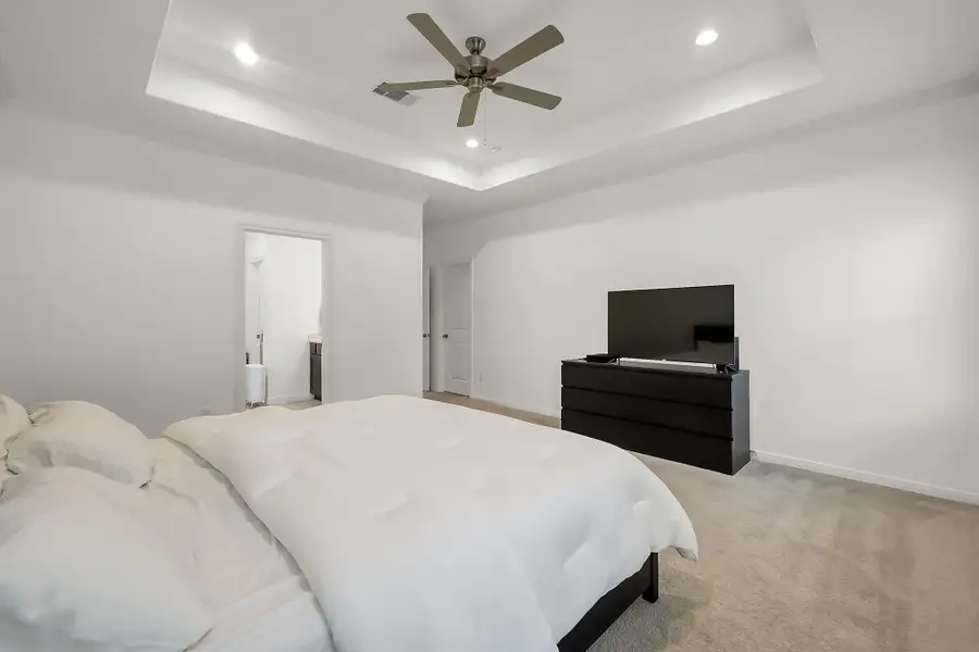 Furnished interior view inside a new home in Lexington Heights, Willis (Image 31).