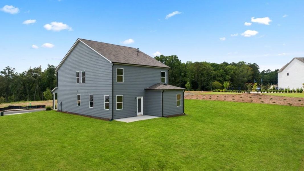 Front exterior of a new home in Sheffield Highlands, Dallas, GA, highlighting curb appeal (Image 2). Front exterior of a new home in Sheffield Highlands, Dallas, GA, highlighting curb appeal (Image 2).
