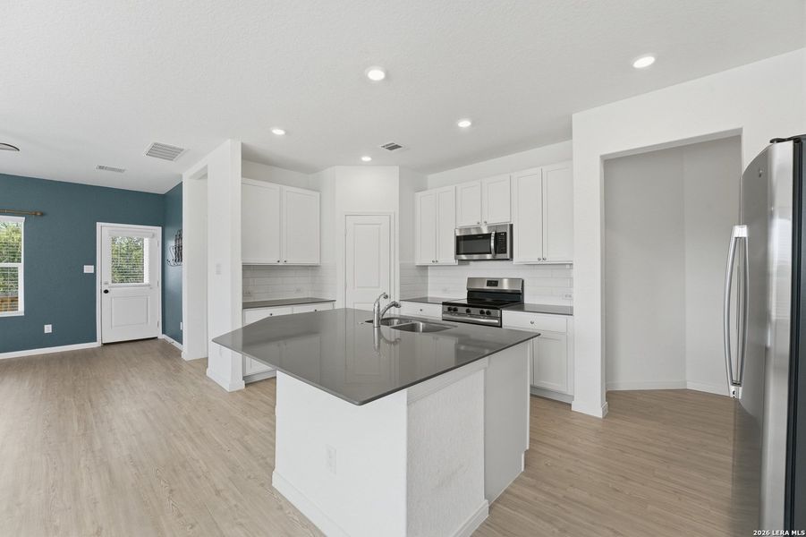 Furnished interior view inside a new home in Guadalupe Heights, Seguin (Image 12).