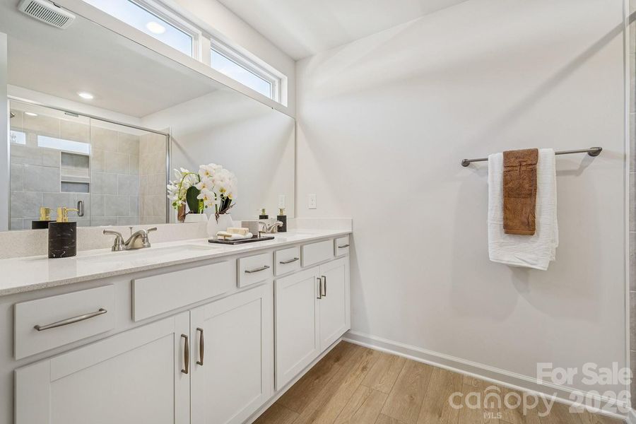 Example rendering Only - Home under construction with estimated completion in April or May.