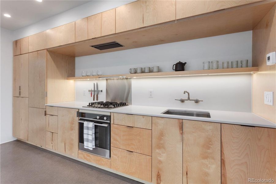 Sleek kitchen design of Unit 1.
