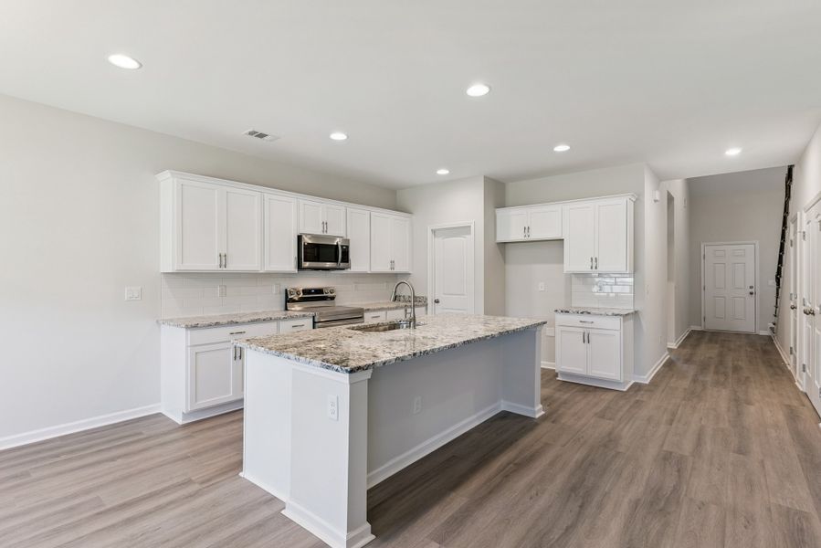 Furnished interior view inside a new home in Woodland Cove, Brunswick (Image 11).