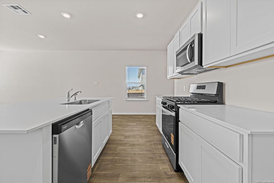 Furnished interior view inside a new home in Redbird Ranch, San Antonio (Image 7).