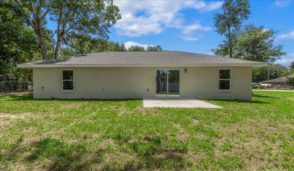 Exterior details and patio area of a home in , Belleview (Image 3).