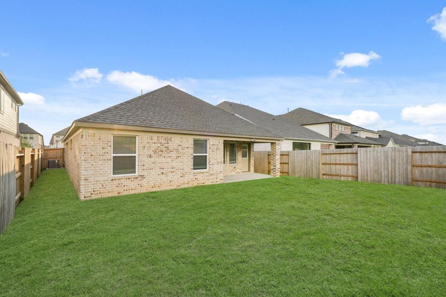 Front exterior of a new home in Sunterra North, Katy, TX, highlighting curb appeal (Image 1). Front exterior of a new home in Sunterra North, Katy, TX, highlighting curb appeal (Image 1).