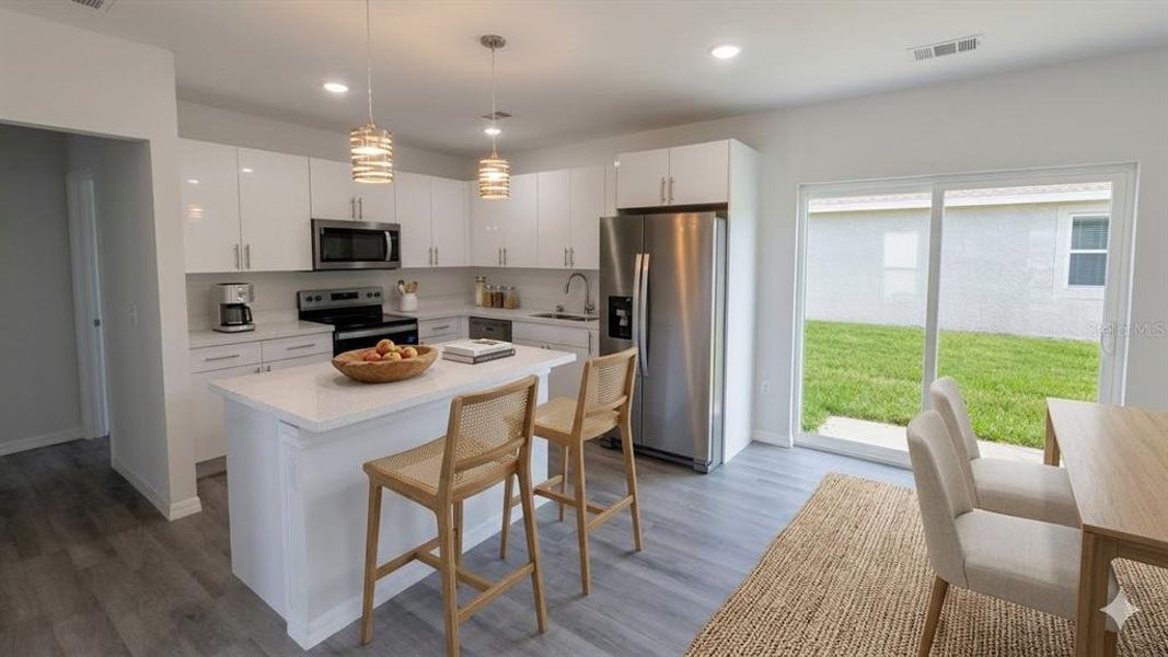 Furnished interior view inside a new home in , Kissimmee (Image 5). Furnished interior view inside a new home in , Kissimmee (Image 5).