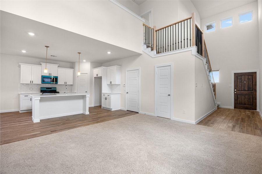 Furnished interior view inside a new home in Creekhaven, Iowa Colony (Image 5).