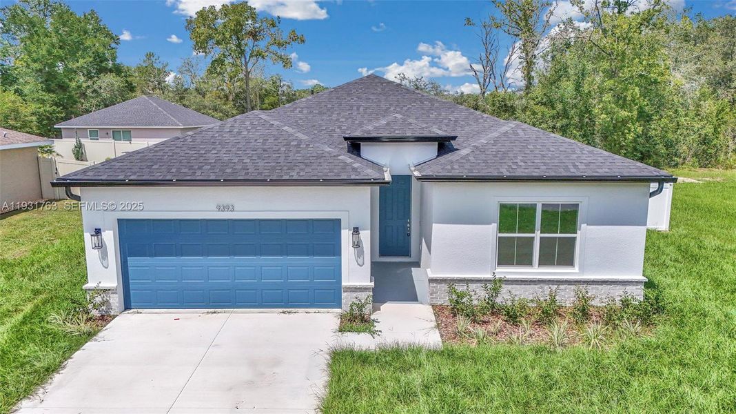 Front exterior of a new home in , Summerfield, FL, highlighting curb appeal (Image 2). Front exterior of a new home in , Summerfield, FL, highlighting curb appeal (Image 2).