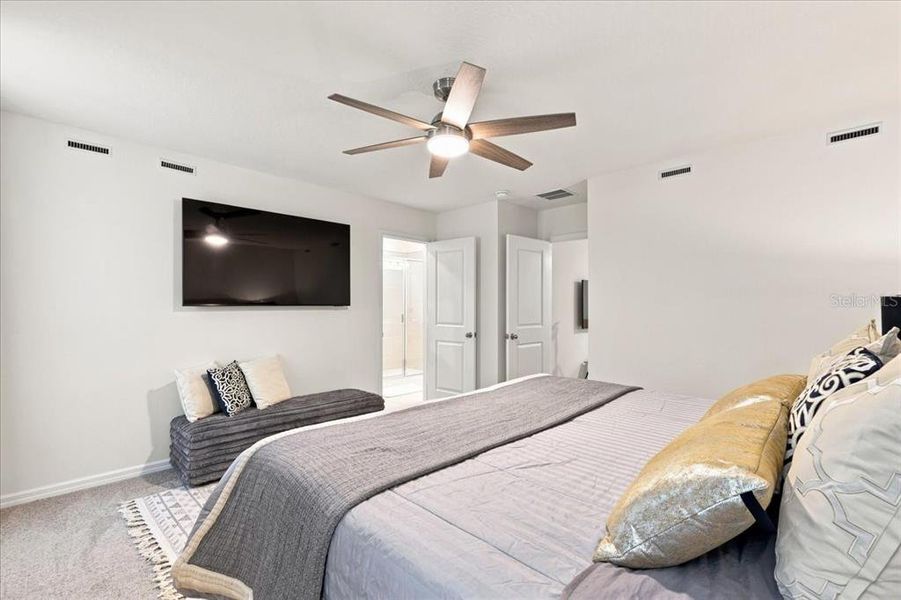 Furnished interior view inside a new home in Towns at Riverwalk, Sanford (Image 31). Furnished interior view inside a new home in Towns at Riverwalk, Sanford (Image 31).