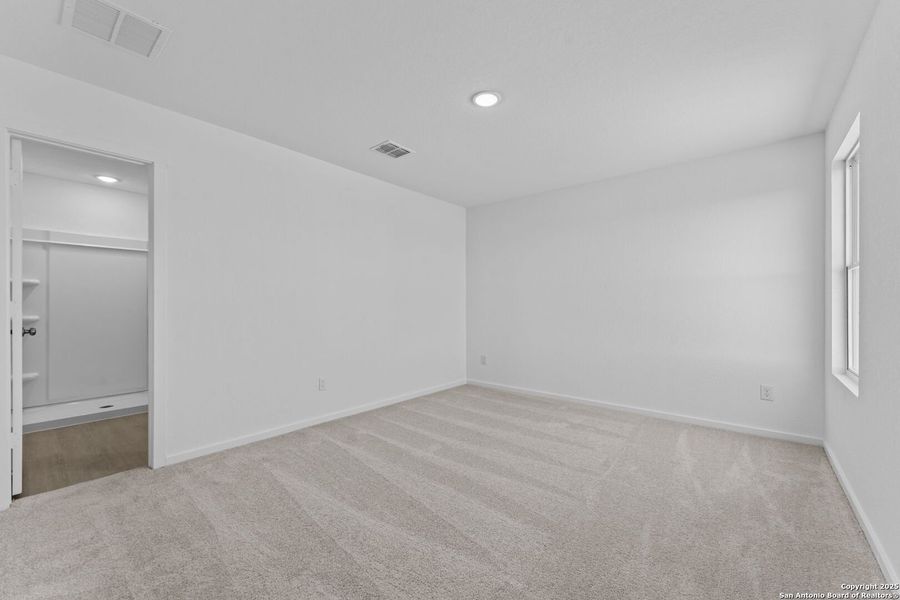 Spacious, unfurnished interior of a new home in Randolph Crossing: Cottage Collection, Converse (Image 17).