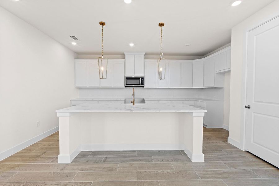 Furnished interior view inside a new home in Parmer Ranch, Georgetown (Image 7).