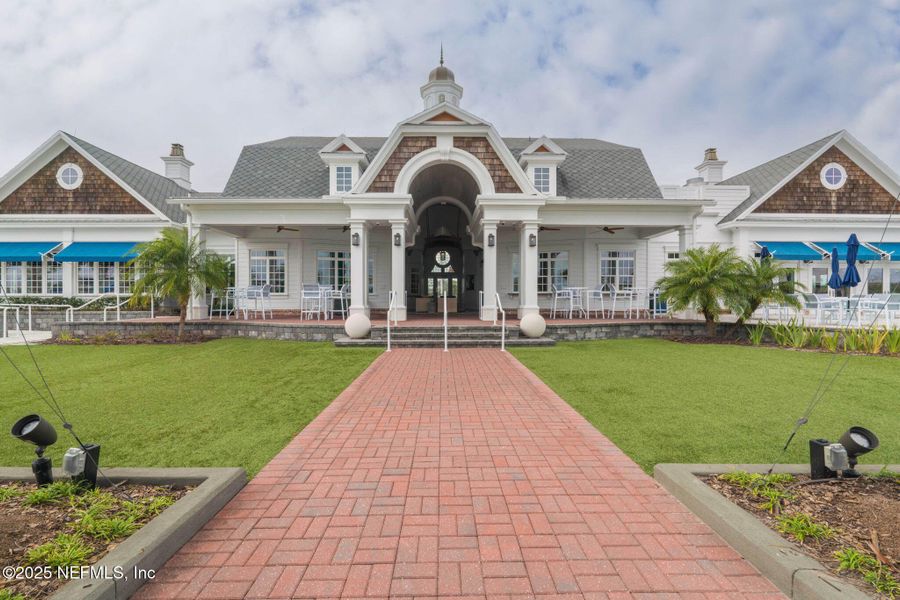 Front exterior of a new home in Beacon Lake, St. Augustine, FL, highlighting curb appeal (Image 31).