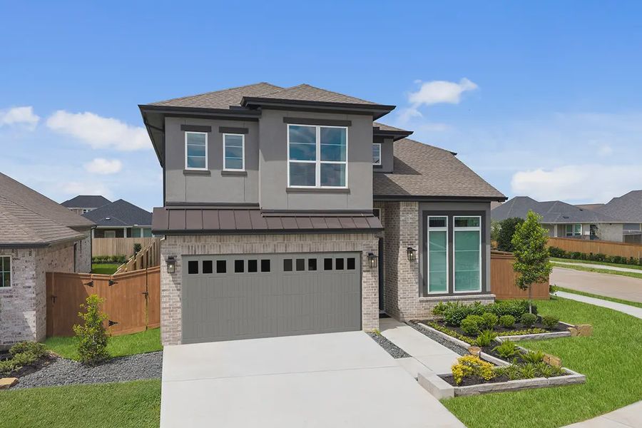 Representative exterior photo of a completed home built from the Laramie by Chesmar Homes in Sunterra, Katy, TX (Image 1). Representative exterior photo of a completed home built from the Laramie by Chesmar Homes in Sunterra, Katy, TX (Image 1).