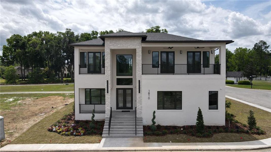 Front exterior of a new home in , Ocala, FL, highlighting curb appeal (Image 22).