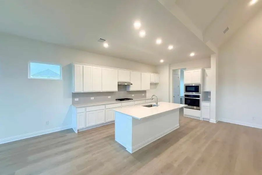 Furnished interior view inside a new home in Ridge Park Estates, Royse City (Image 5).