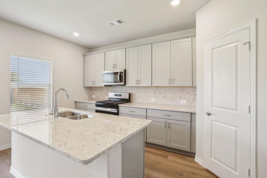 Furnished interior view inside a new home in Westmoor, Sherman (Image 6).