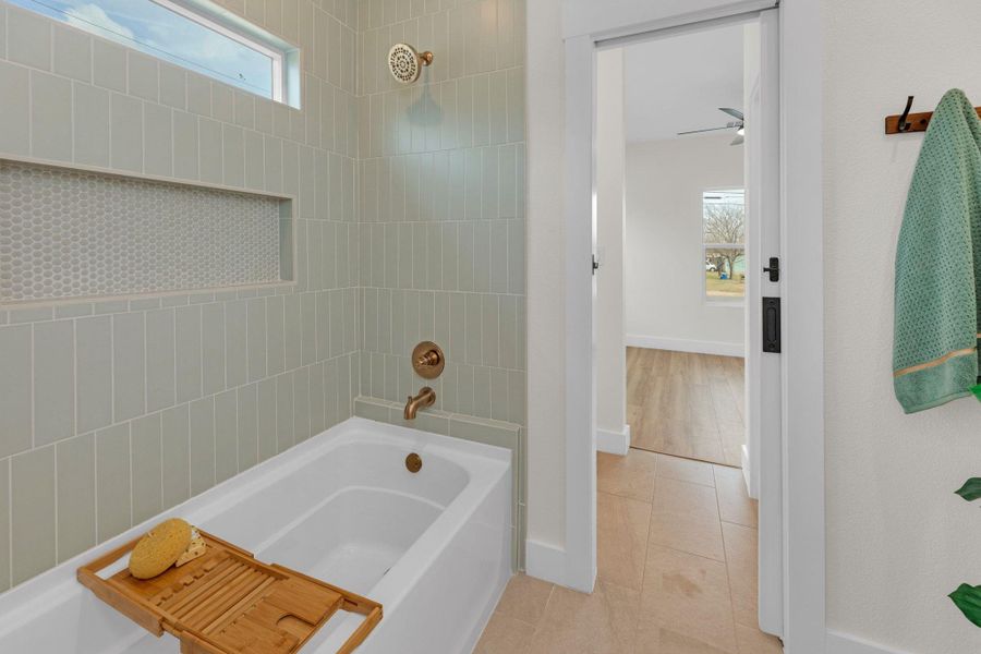 Jack and Jill bathroom with tub.
