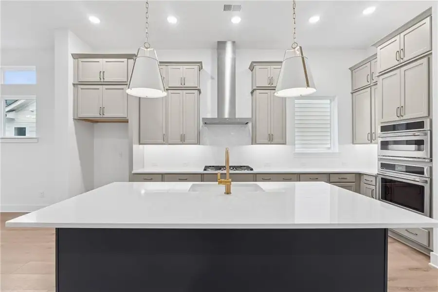 Furnished interior view inside a new home in Crescent Pointe at Great Sky, Canton (Image 5).