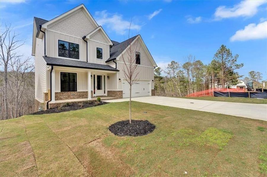Front exterior of a new home in , Cartersville, GA, highlighting curb appeal (Image 20).
