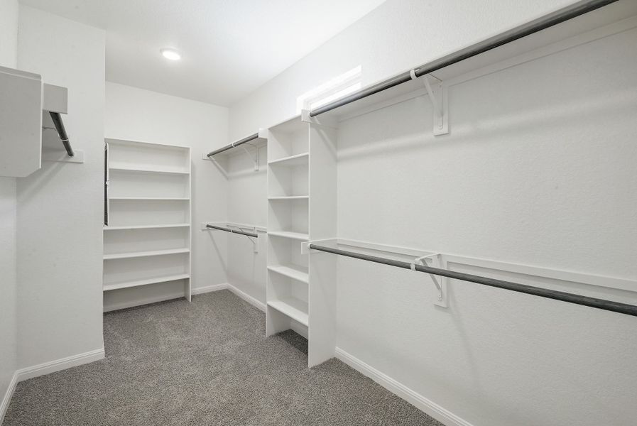Primary Closet in the Willow home plan by Trophy Signature Homes – REPRESENTATIVE PHOTO Primary Closet in the Willow home plan by Trophy Signature Homes – REPRESENTATIVE PHOTO