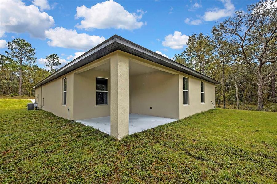Exterior details and patio area of a home in , Weeki Wachee (Image 38).