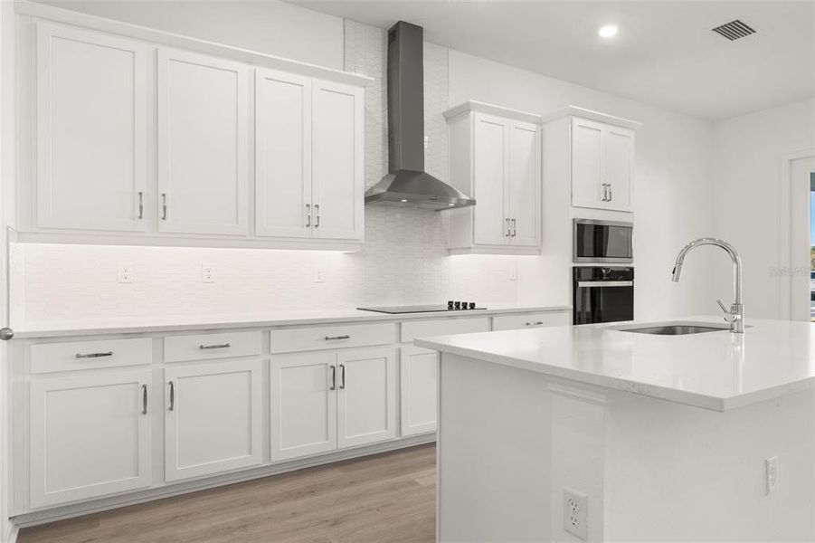 Furnished interior view inside a new home in Serenade at Ovation, Winter Garden (Image 8).