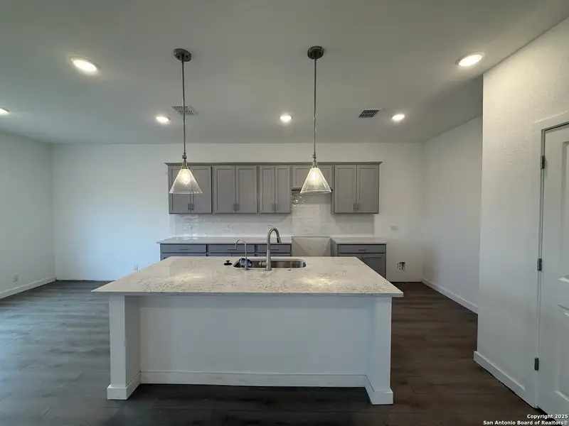 Furnished interior view inside a new home in Meadows at Hennersby Hollow 40's, San Antonio (Image 9).