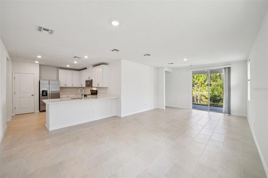 Spacious, unfurnished interior of a new home in Ridgehaven - Villas, Ormond Beach (Image 19).
