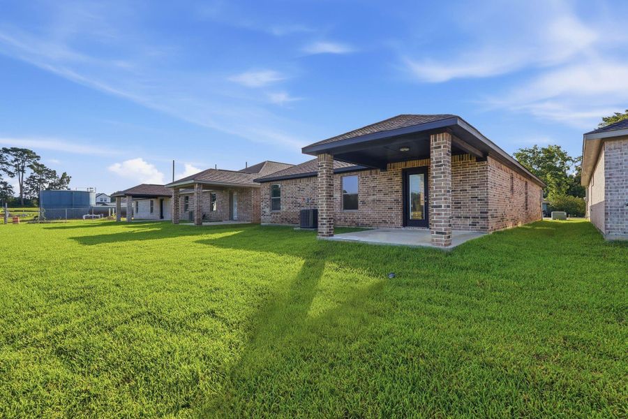 Exterior details and patio area of a home in , Willis (Image 4). Exterior details and patio area of a home in , Willis (Image 4).