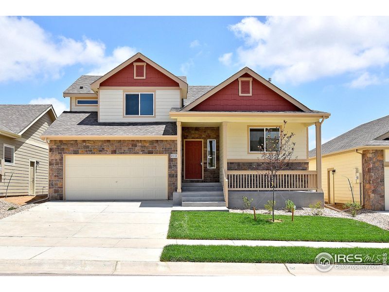 Front exterior of a new home in , Johnstown, CO, highlighting curb appeal (Image 1).