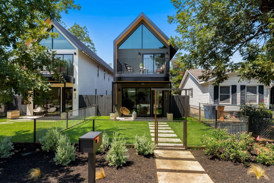 Front exterior of a new home in , Austin, TX, highlighting curb appeal (Image 1). Front exterior of a new home in , Austin, TX, highlighting curb appeal (Image 1).