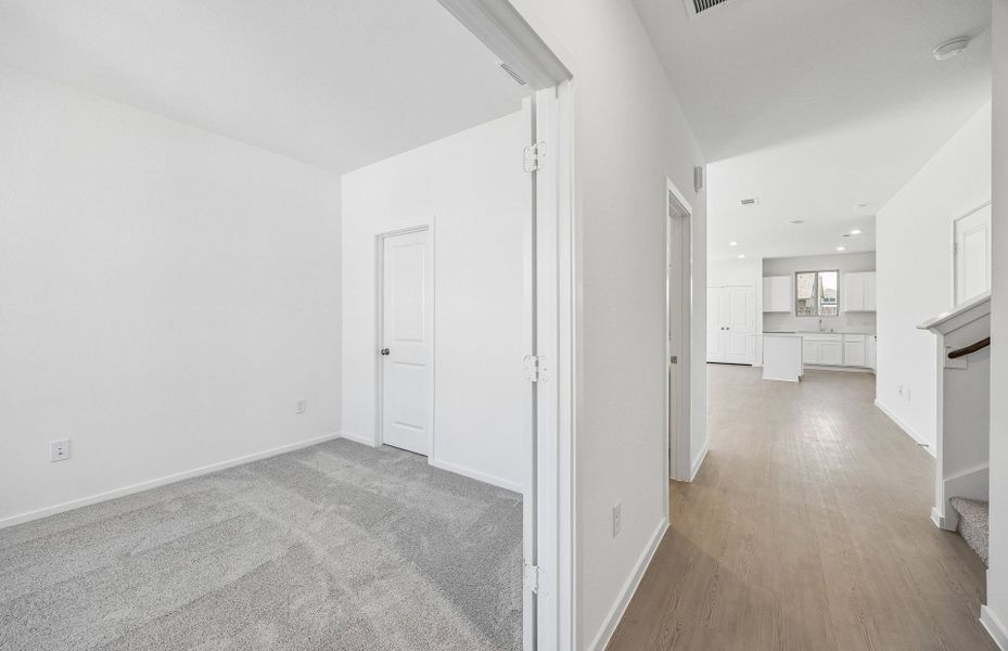 Spacious, unfurnished interior of a new home in Mavera, Conroe (Image 26). Spacious, unfurnished interior of a new home in Mavera, Conroe (Image 26).