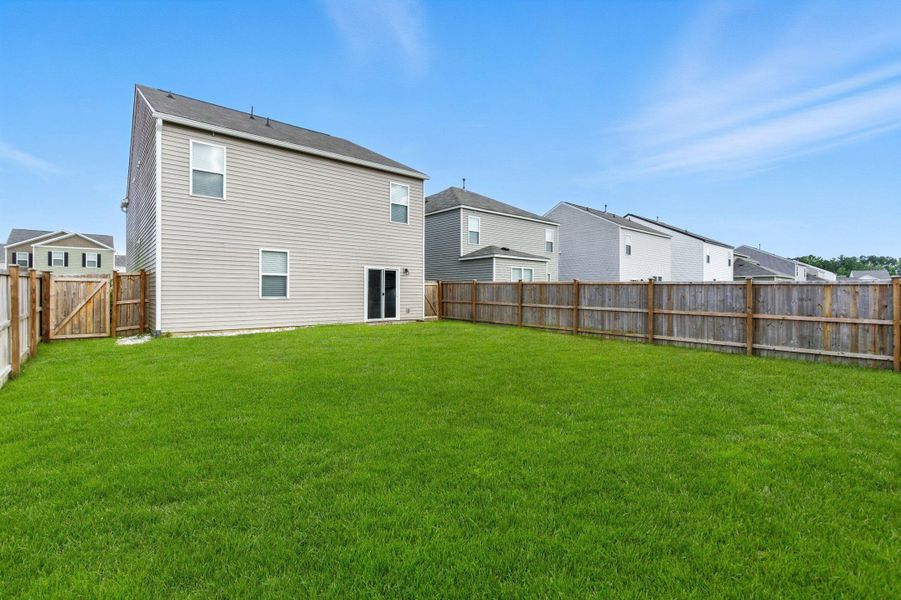 Exterior details and patio area of a home in , Summerville (Image 4).