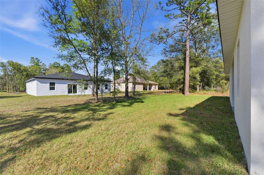 Exterior details and patio area of a home in , Citrus Springs (Image 21).