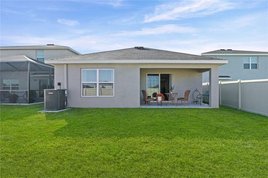 Exterior details and patio area of a home in Silverstone North, Palmetto (Image 25).