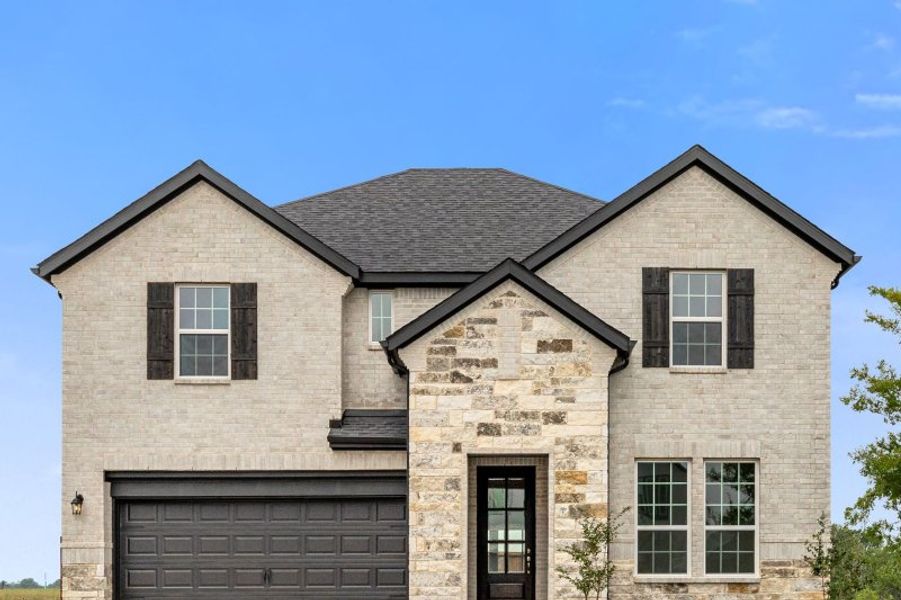 Representative exterior photo of a completed home built from the Trinity by UnionMain Homes in Elevon, Lavon, TX (Image 2). Representative exterior photo of a completed home built from the Trinity by UnionMain Homes in Elevon, Lavon, TX (Image 2).