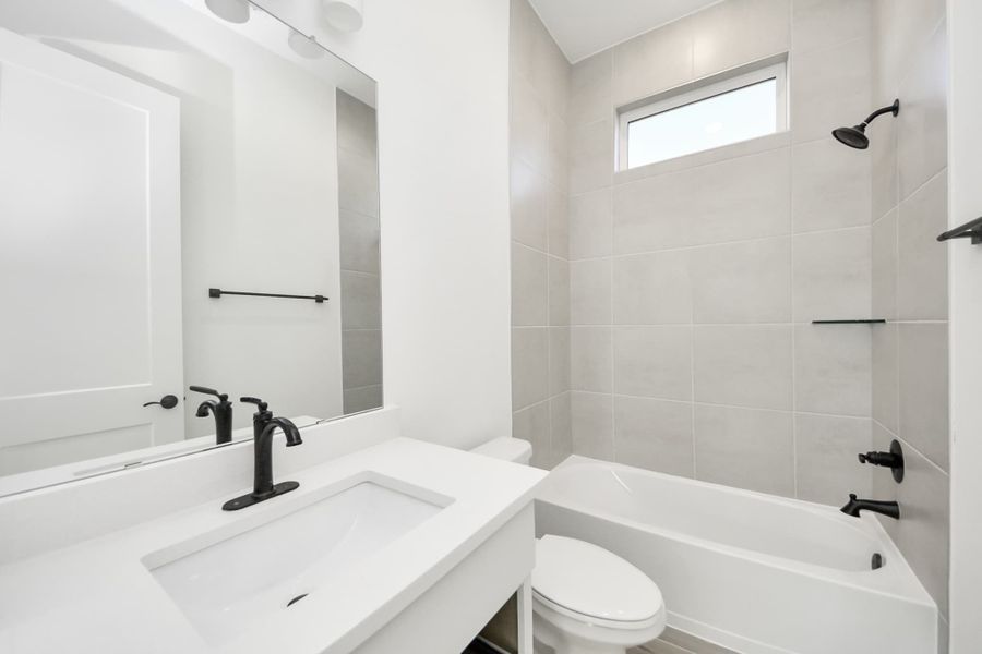 Furnished interior view inside a new home in Meridiana, Manvel (Image 18).