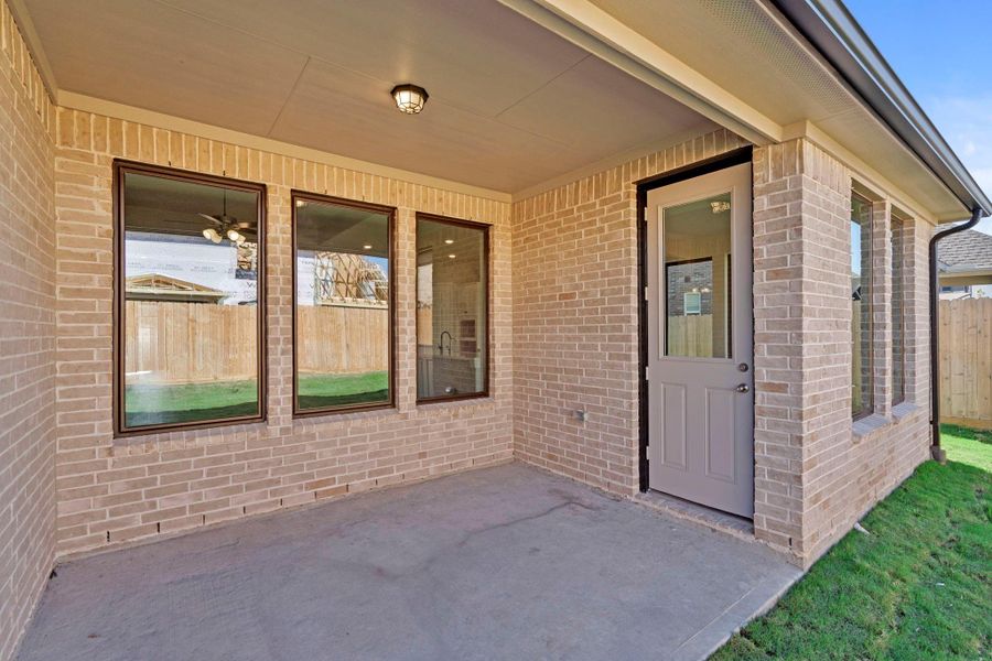 The covered patio is generously sized, providing ample space for various outdoor activities. The covered patio is generously sized, providing ample space for various outdoor activities.