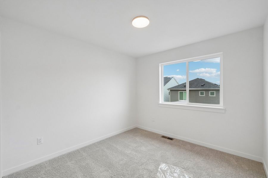 Spacious, unfurnished interior of a new home in Parkside at Victory Ridge, Colorado Springs (Image 33).