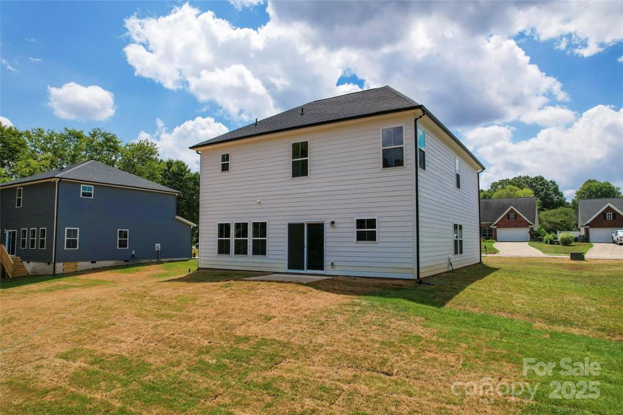 Front exterior of a new home in , Harrisburg, NC, highlighting curb appeal (Image 1).