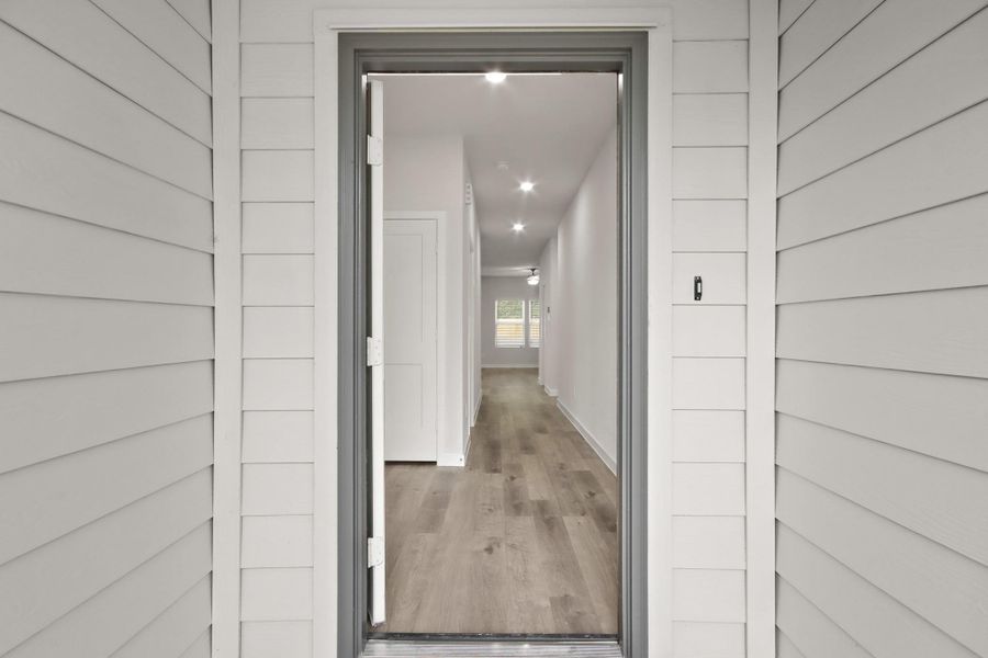 Exterior details and patio area of a home in Lakes at Crockett Martin, Conroe (Image 18).