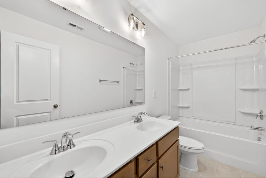 Furnished interior view inside a new home in White Oak Creek Crossing, Angier (Image 27).