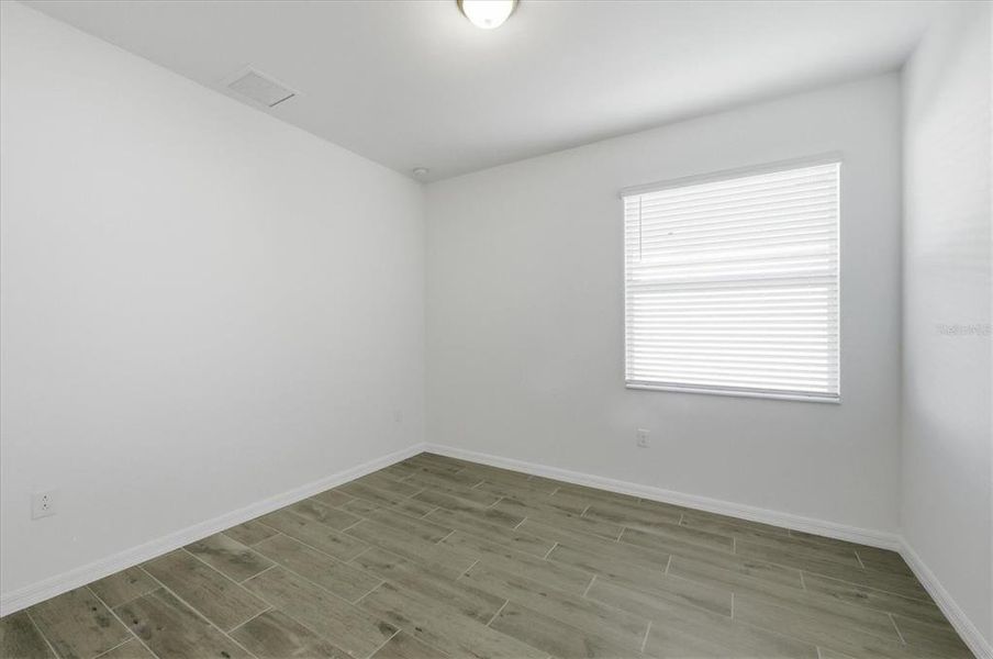 Spacious, unfurnished interior of a new home in Heritage Landing, Punta Gorda (Image 42).