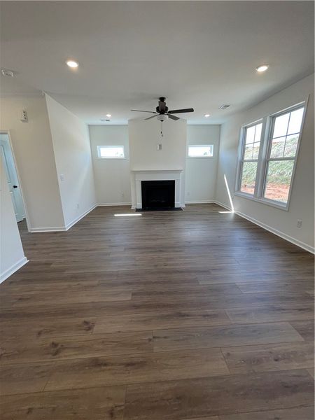 This airy living space features soaring ceilings,