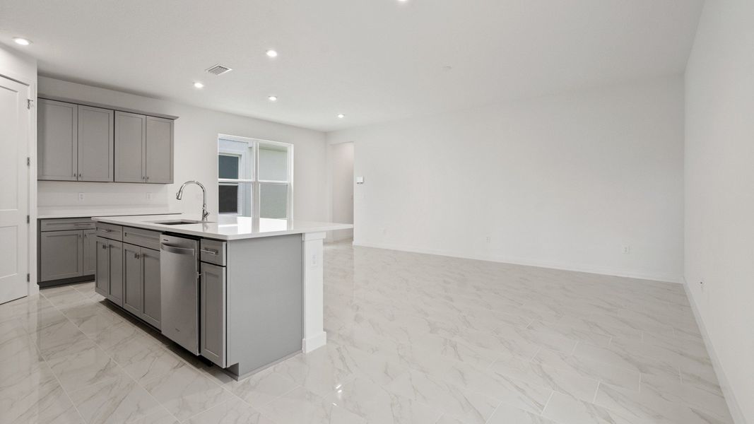 Mandarin view of the Kitchen and Living Area by DRB Homes in Trinity place by DRB Homes Orlando in Saint Cloud, FL Mandarin view of the Kitchen and Living Area by DRB Homes in Trinity place by DRB Homes Orlando in Saint Cloud, FL