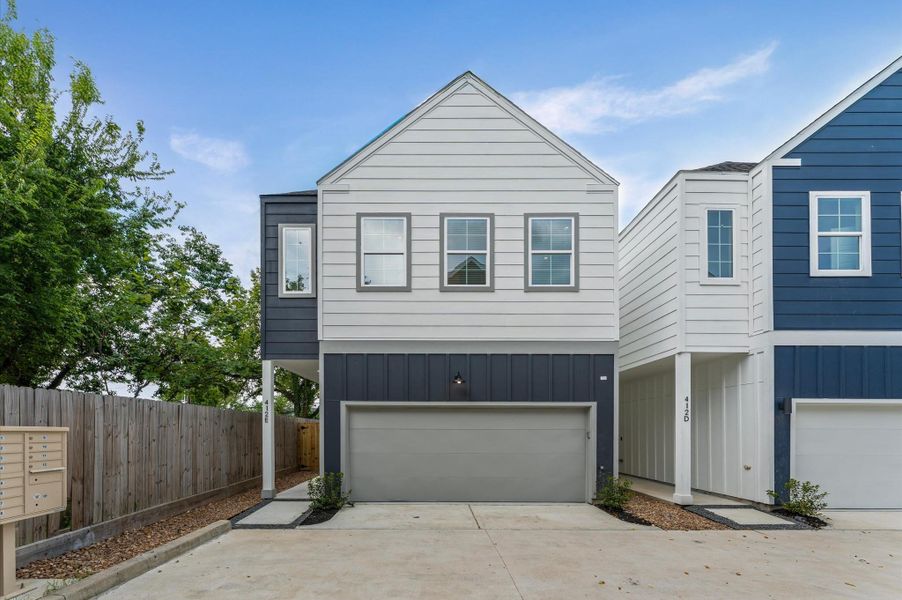 This inviting home features a spacious open-concept layout on the first floor, seamlessly connecting the living, dining, and kitchen areas to create a warm and functional gathering space. Large windows and glass door direct access to the backyard flooding the interior with natural light and extending the living space outdoors, perfect for entertaining or relaxing in the fresh air. The thoughtful design balances comfort and flow, making everyday living feel effortlessly connected to nature.