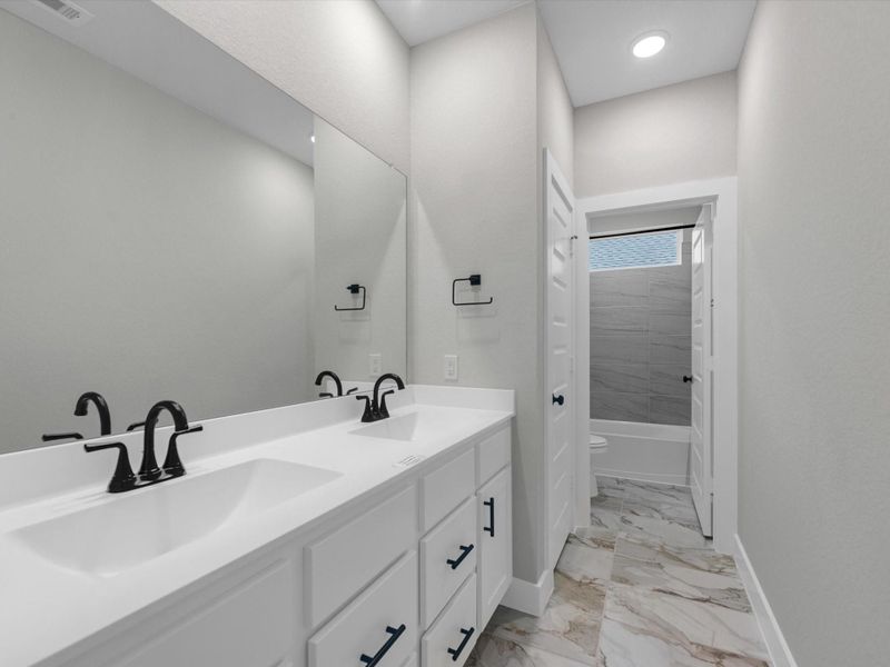 Furnished interior view inside a new home in Oakhill Reserve, Tomball (Image 9).